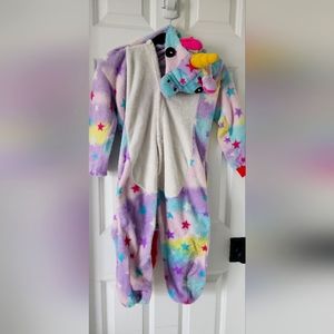 Unicorn onesie and Halloween treat bucket